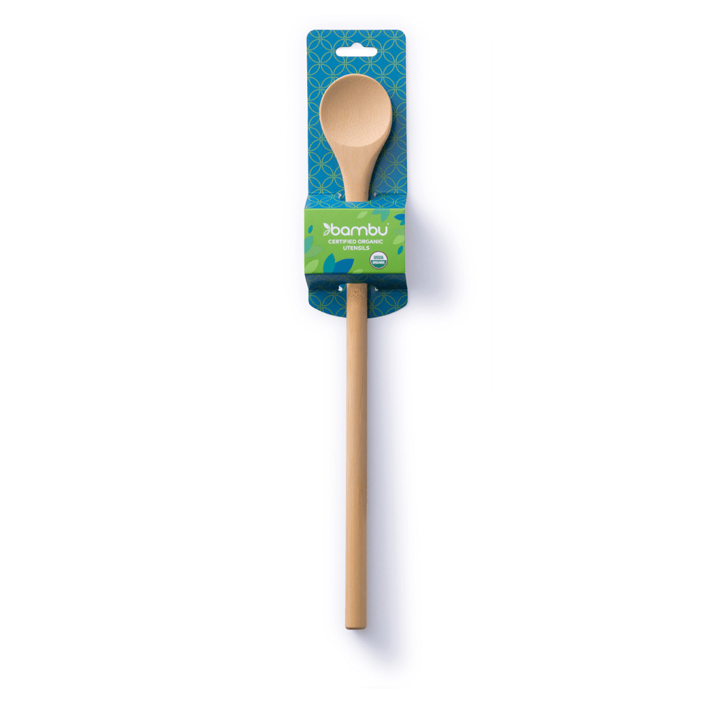 A bamboo tasting spoon is shown in blue packaging. 