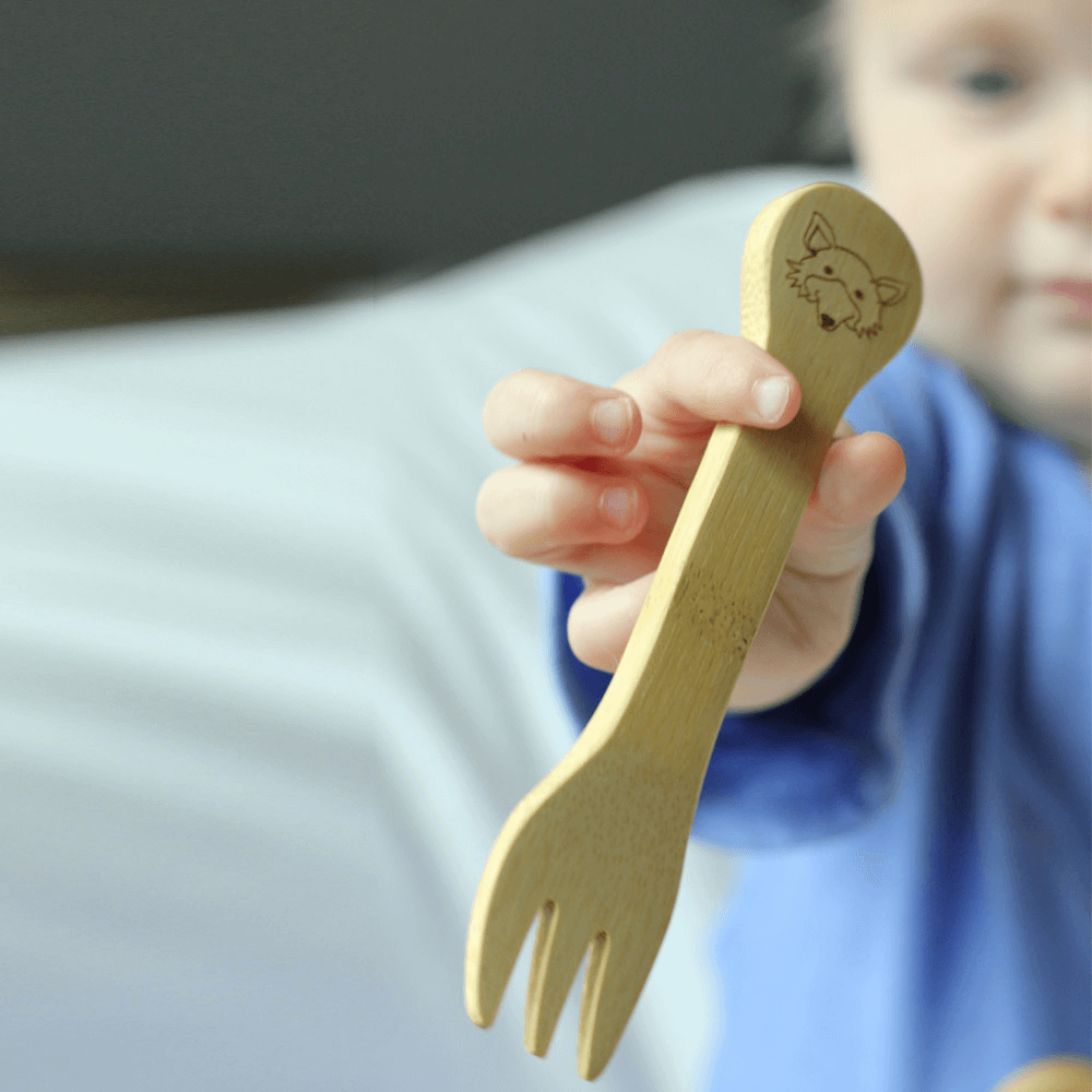 Organic Bamboo Kid's Fork & Spoon (18M+) baby holding fork