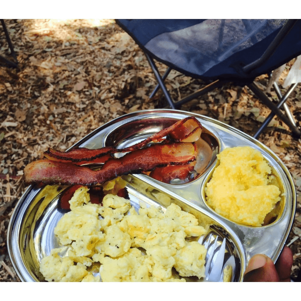 Bacon, eggs and cornbread are ready for breakfast, served on an Eco Lunchbox Camping Tray.