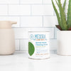 Meliora Cleaning Products: Gentle Home Cleaning Scrub in eco-friendly tub.