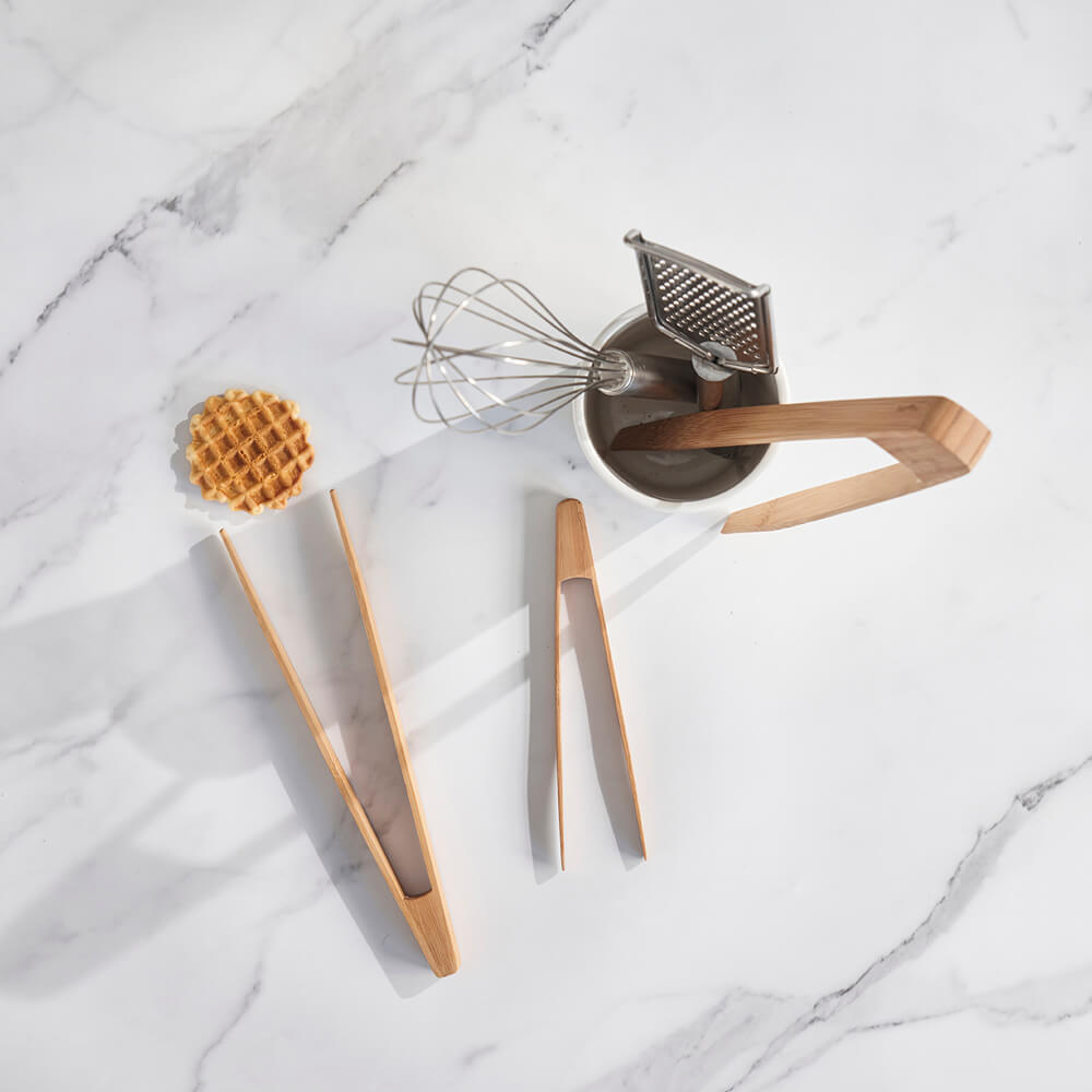 Tongs Set (Large, Small and Tiny) are laid on a marble countertop.
