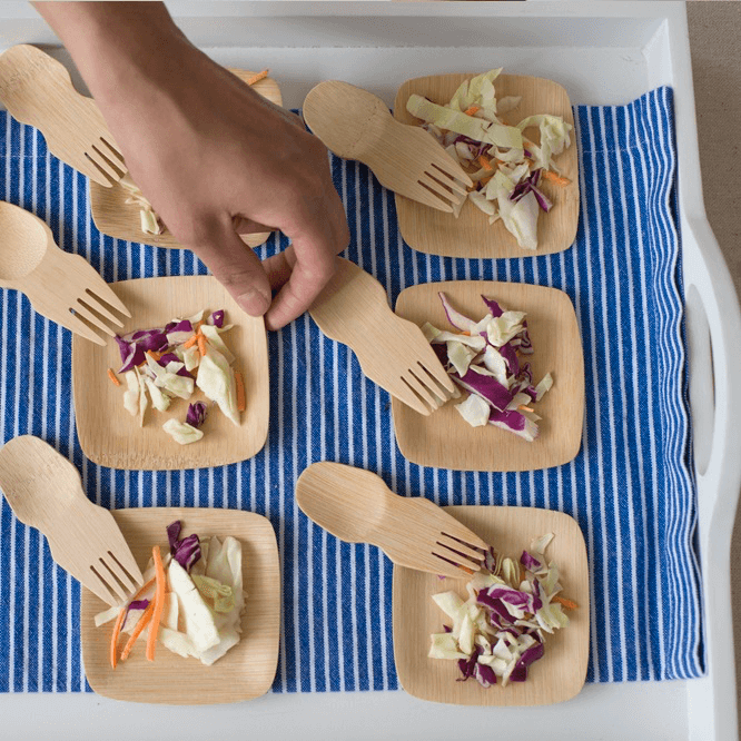 A tray of small bites is served up on Veneerware® 3.5" Bamboo Tasting Plates. 
